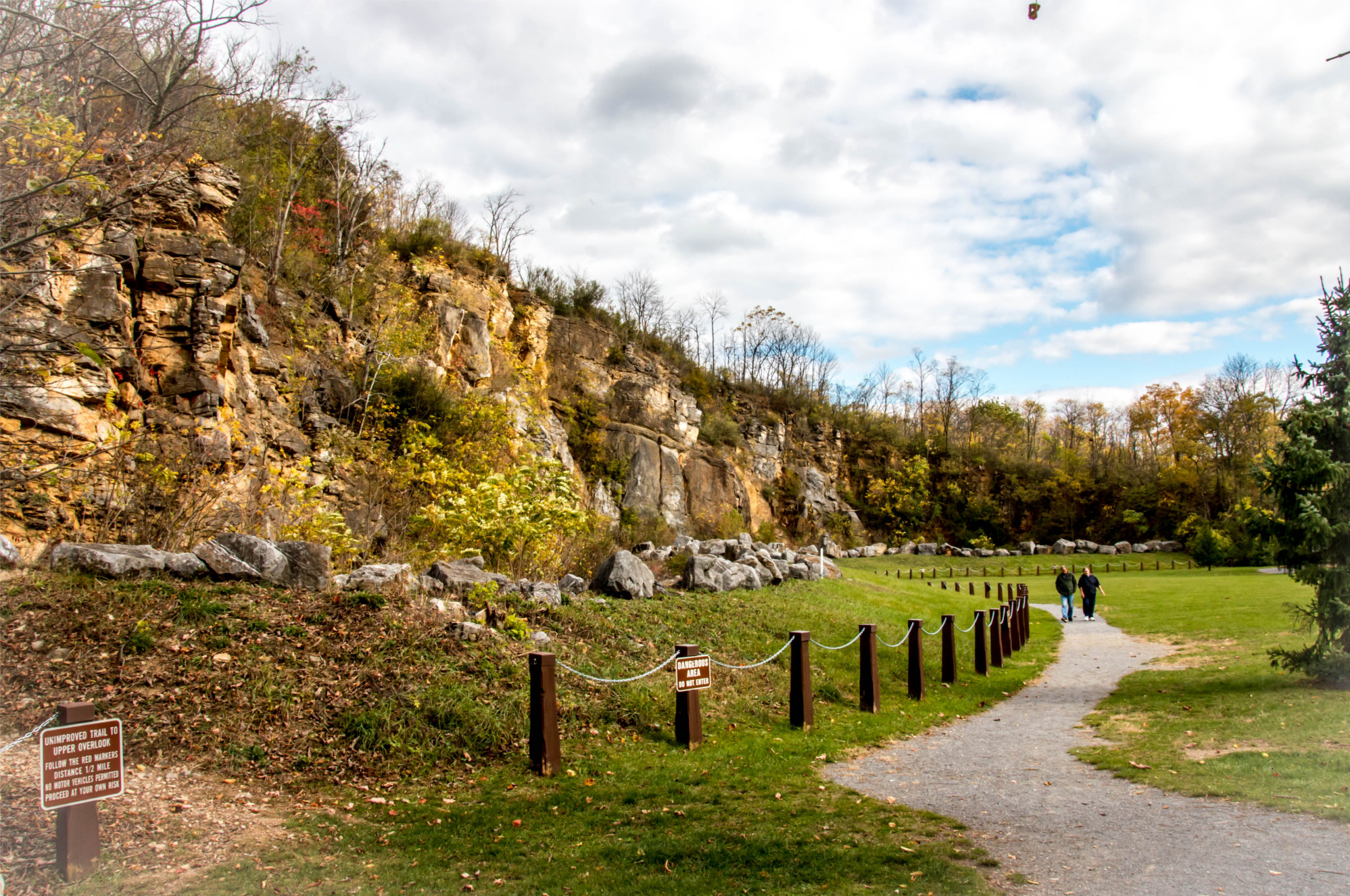 trail with hill beside it